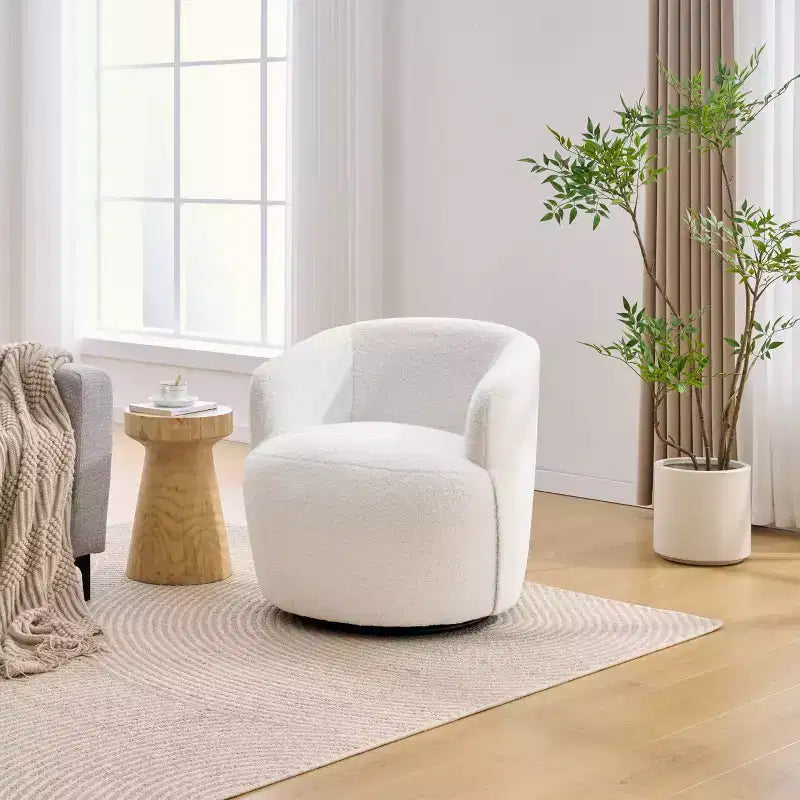 Poltrona girevole Teddy con rivestimento in tessuto e schienale ergonomico per soggiorno