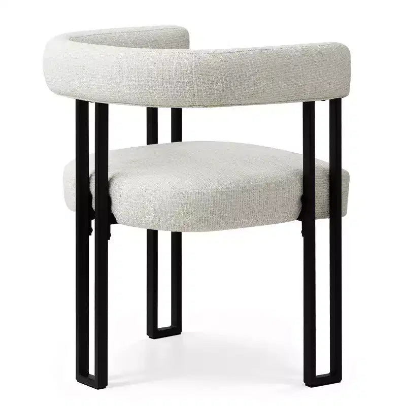 Set di 4 sedie da pranzo moderne imbottite con braccioli, schienale curvo e gambe in metallo nero